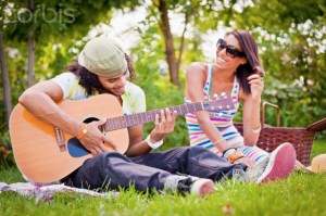 I'm a-strummin the guitar so the girls will be a-comin.